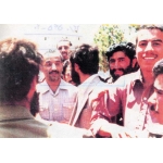 محمد اثری‌نژاد در کنار شهید رجایی | منبع: نوید شاهد